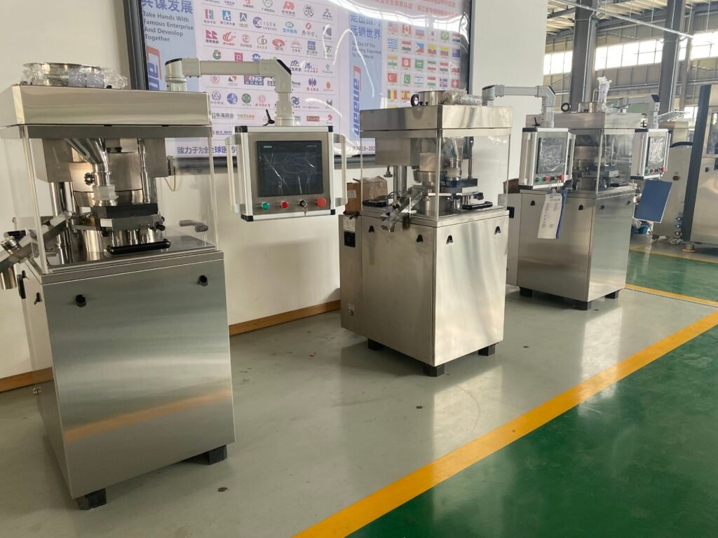 The production workshop is neatly arranged with rows of automatic tablet presses