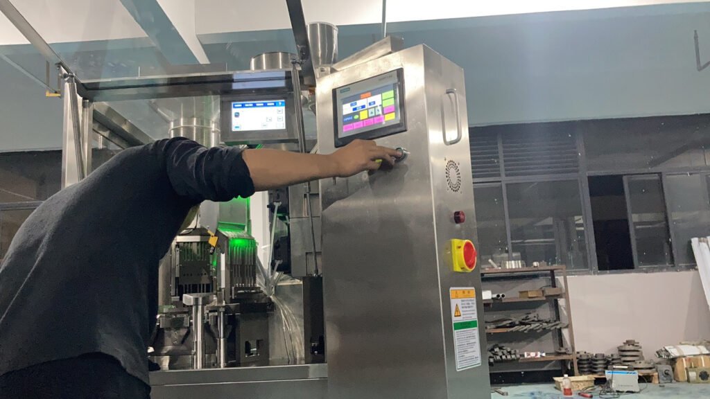 A technician is commissioning the machine.