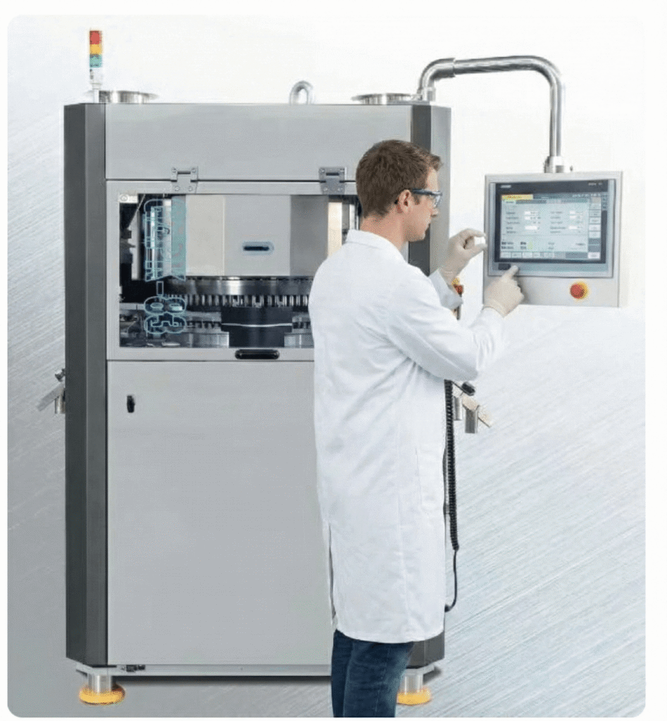 Operator adjusting settings on a user-friendly automatic pill presser.